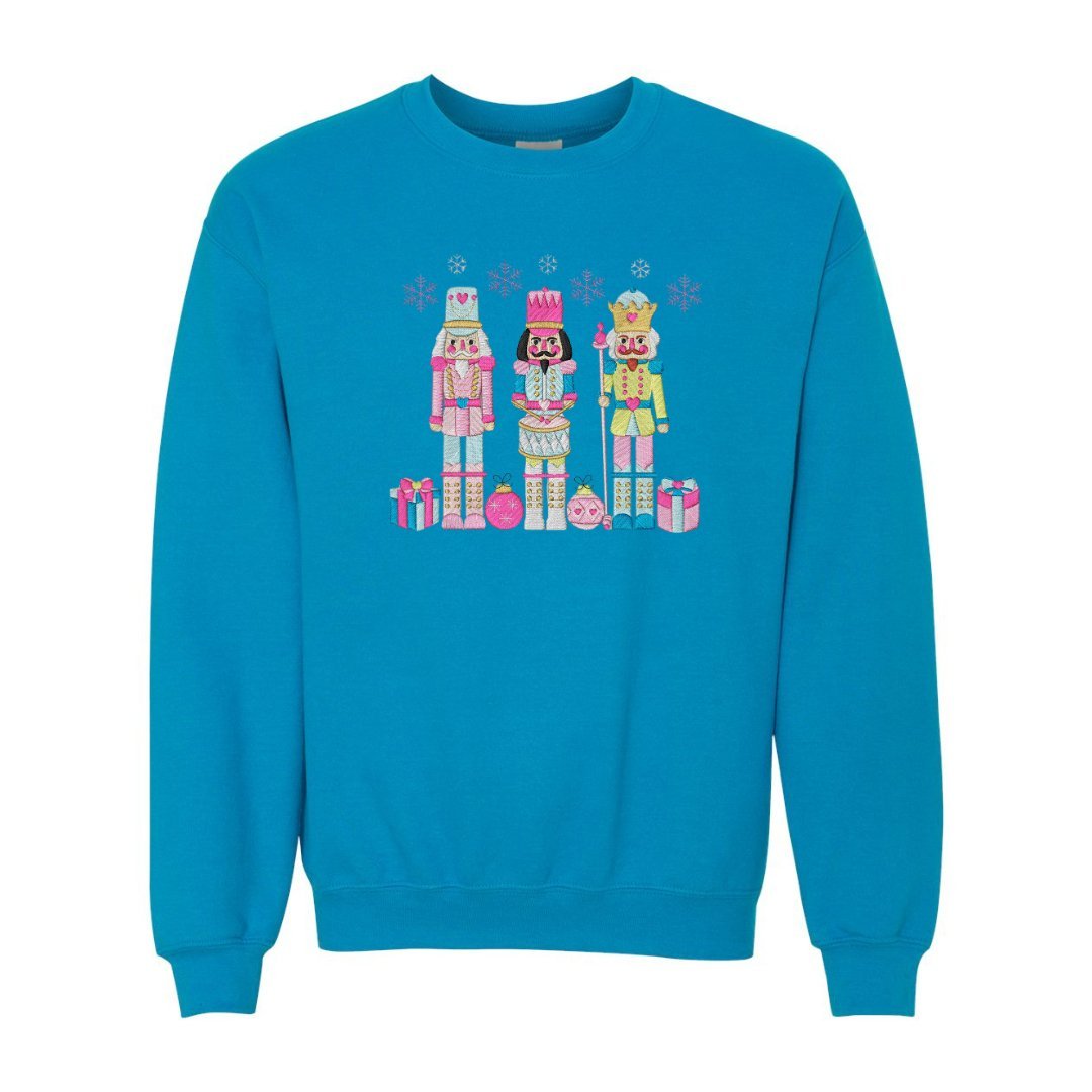Festive Trio Embroidered Nutcracker Christmas Sweatshirt - Embroiderzilla
