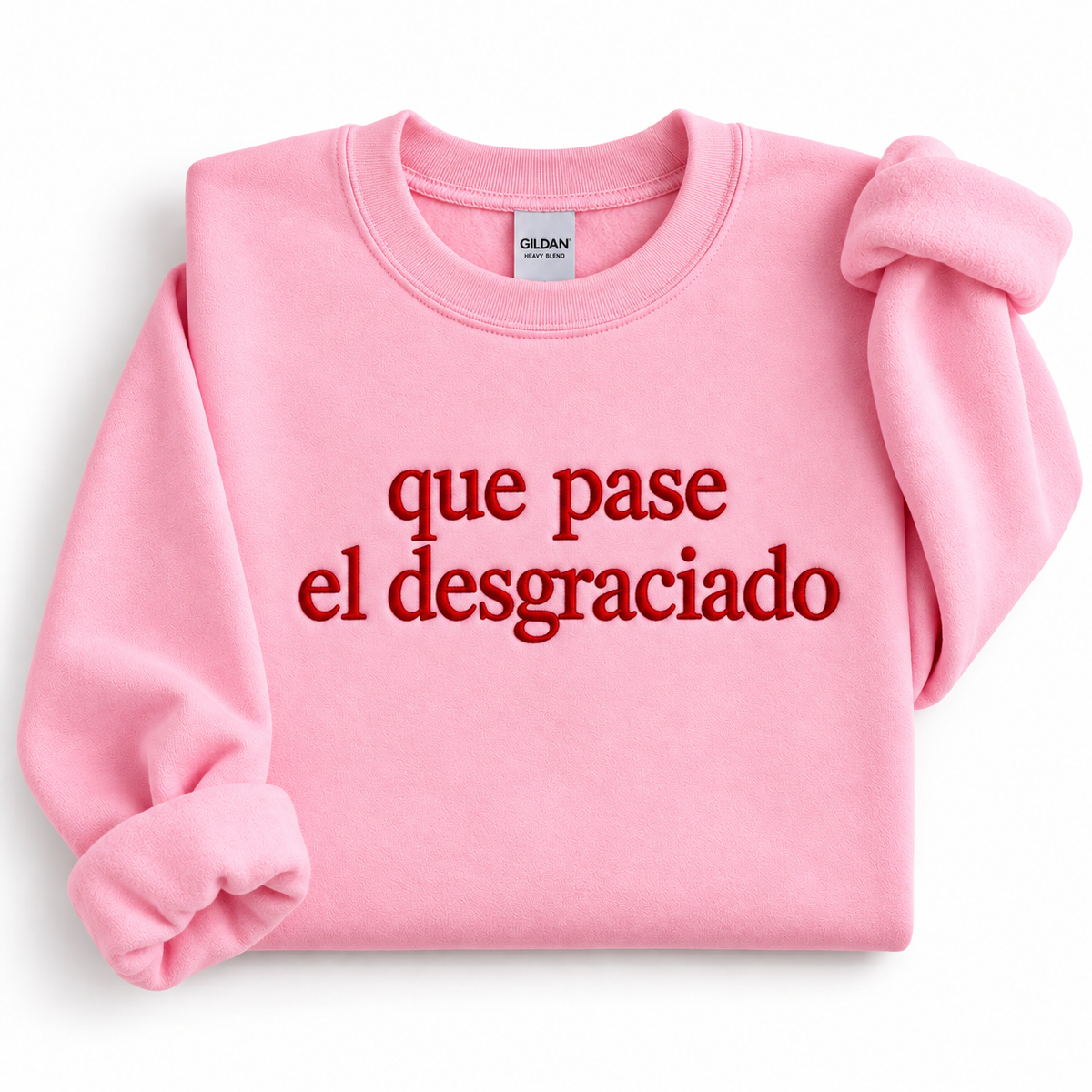 Pink embroidered sweatshirt with red Que Pase El Desgraciado design