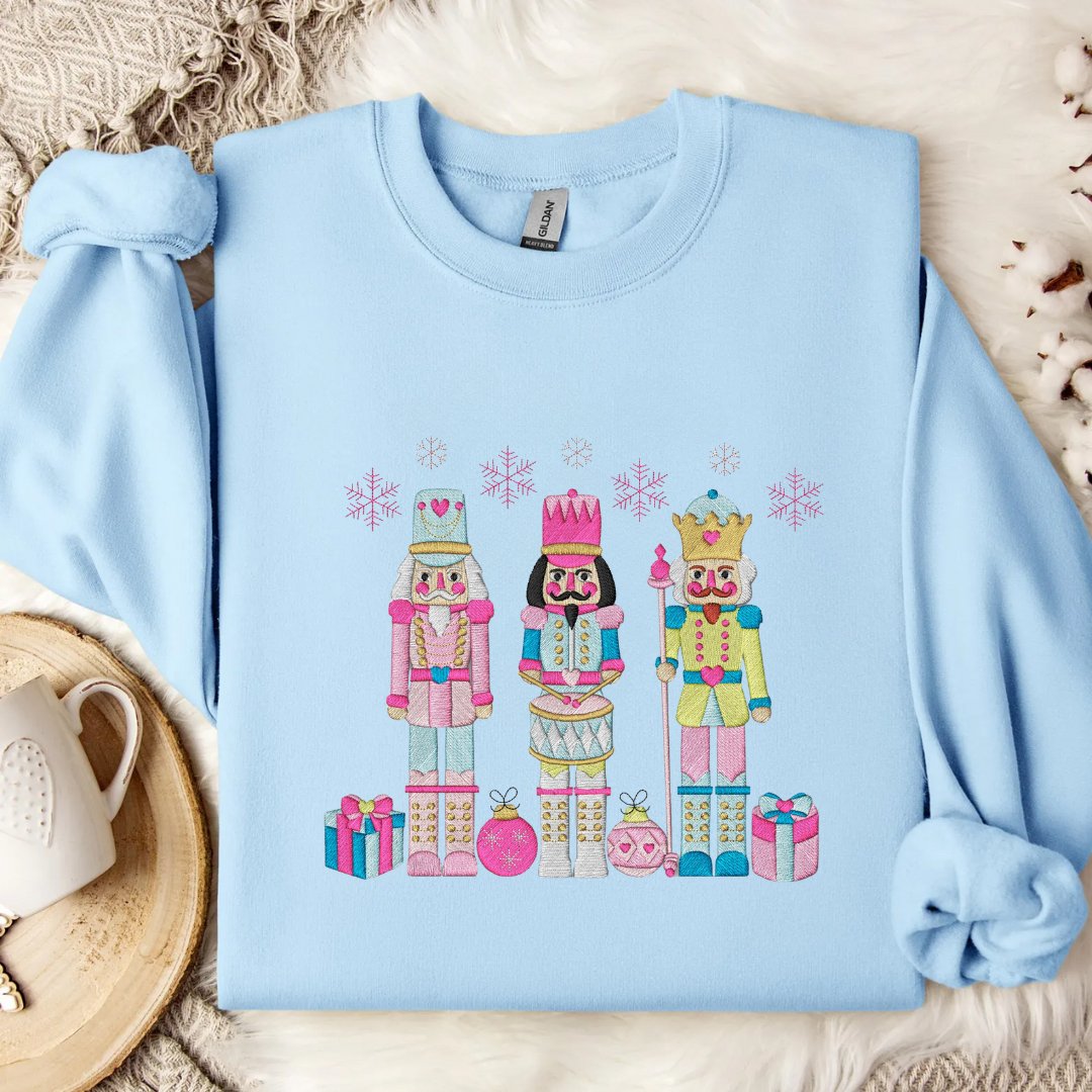 Festive Trio Embroidered Nutcracker Christmas Sweatshirt - Embroiderzilla