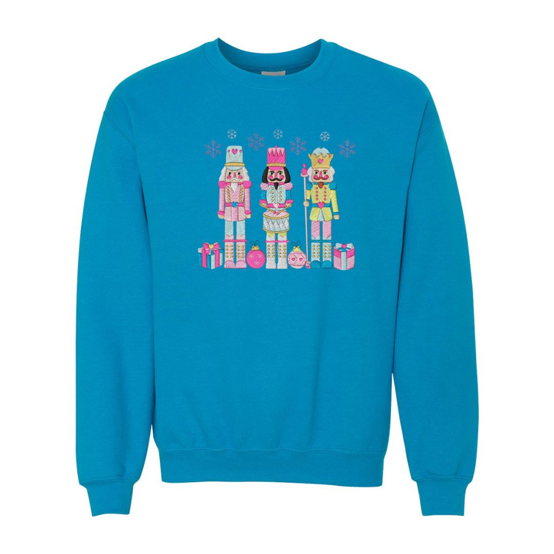 Festive Trio Embroidered Nutcracker Christmas Sweatshirt - Embroiderzilla