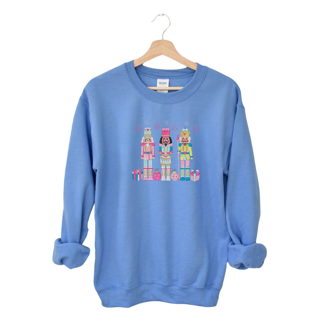 Festive Trio Embroidered Nutcracker Christmas Sweatshirt - Embroiderzilla